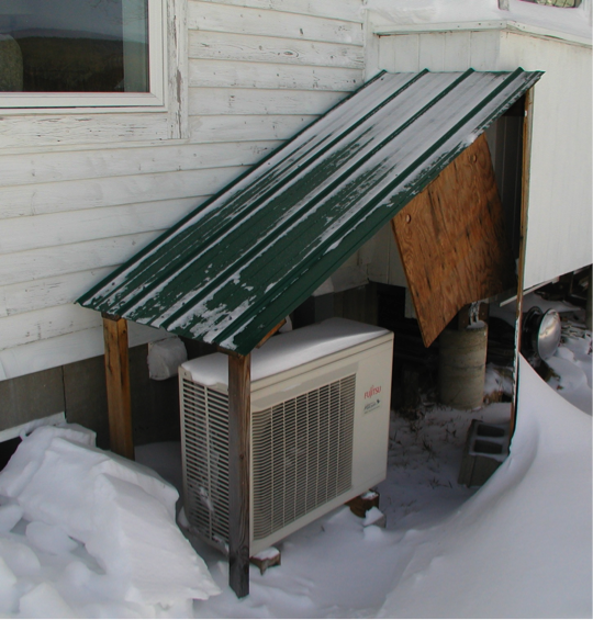heat pump blowing cold air outside unit