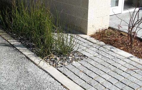 Permeable concrete pavements: A review of environmental benefits